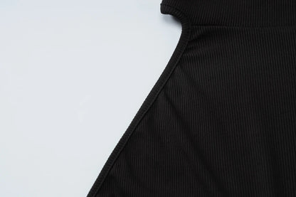 Hugcitar Ribbed Halter Backless Solid Button Sexy Bodycon Skinny Jumpsuit Summer Women Fashion Vacation Romper Streetwear Club