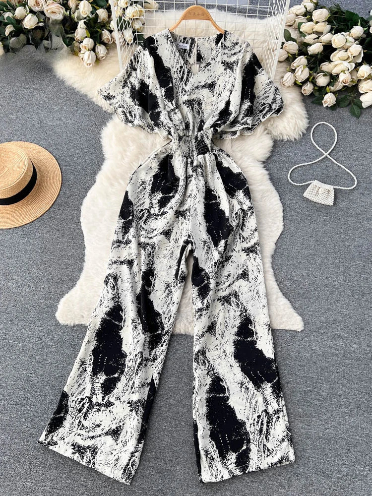 2026 New Summer Beach Summer Floral Jumpsuits Fashion V Neck Elastic Slim Short Sleeve Streetwear Vacation Retro Long Rompers