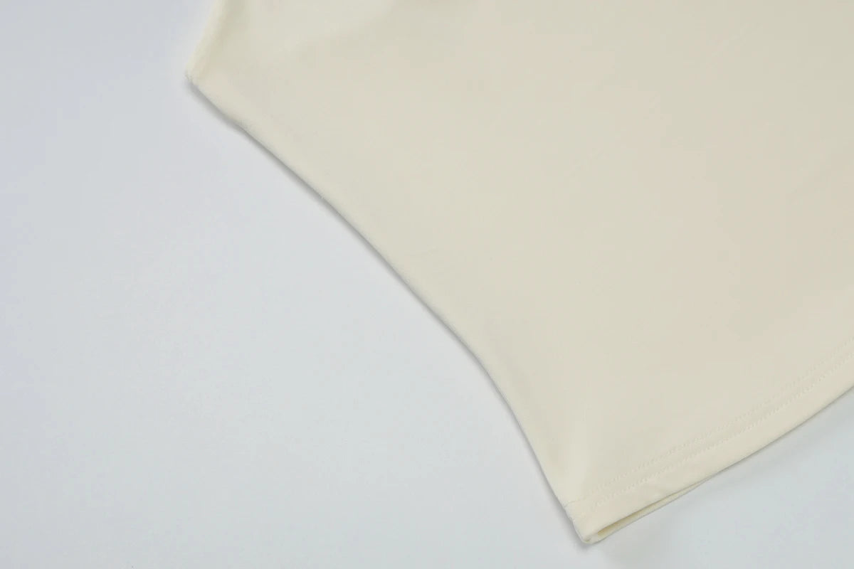Hugcitar Women Fashion Halter Solid Loop Backless Bandage Sexy Crop Tank Top 2025 Summer Casual Clothes Streetwear Vacation Club