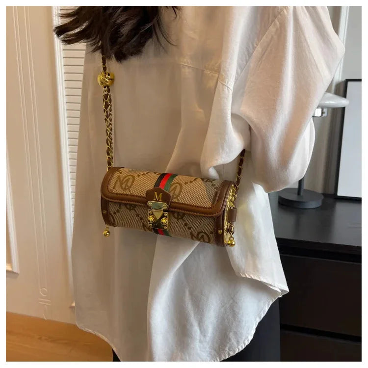 Light luxury brand-name high-end designer bag female 2025 new spring and summer niche shoulder bag messenger bag cylinder bag