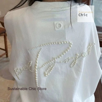 Korean version of fashion stereoscopic Pearl senior loose round neck T-shirt women's summer fashion and leisure niche design top