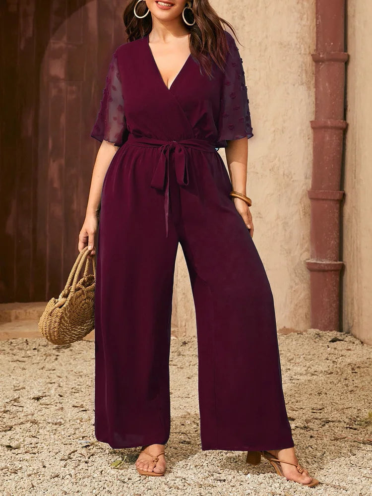 GIBSIE Plus Size Swiss Dot Flounce Sleeve Belted Jumpsuit Women Summer V-neck Elegant Vacation Solid Color Wide Leg Jumpsuits