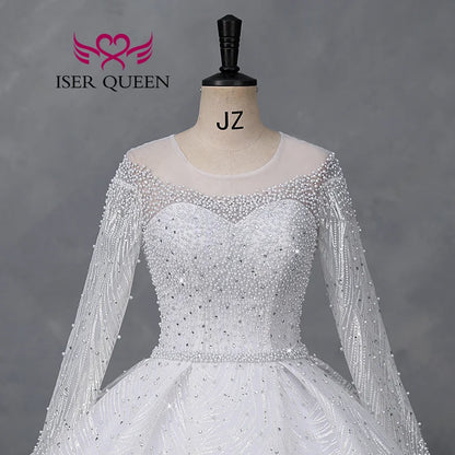 Customized Sheer Neck Long Sleeves Wedding Dress 2026 New Fashion Pearls And Crystal Beaded Luxury Wedding Dress Bride WX0467