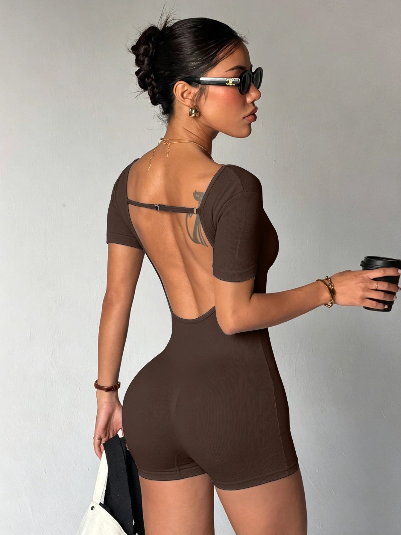 Short sleeved yoga jumpsuit with hollowed out back, casual fitness pants, one-piece quick drying