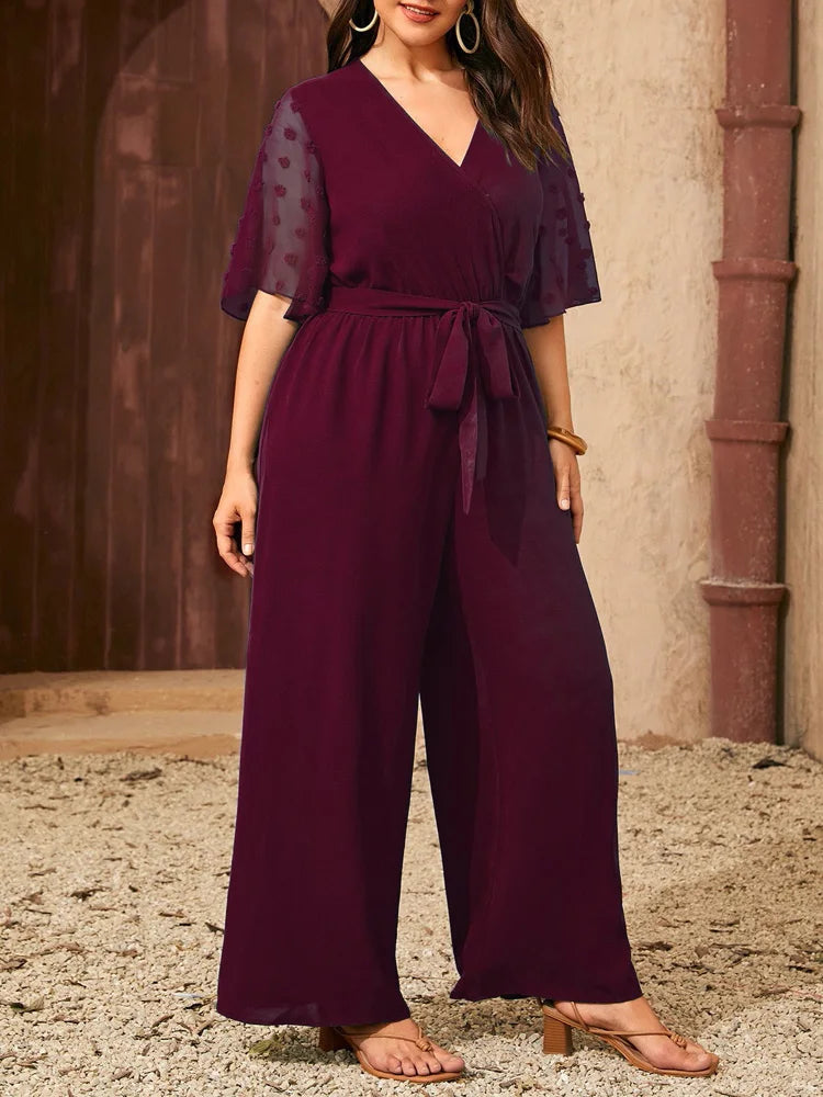 GIBSIE Plus Size Swiss Dot Flounce Sleeve Belted Jumpsuit Women Summer V-neck Elegant Vacation Solid Color Wide Leg Jumpsuits
