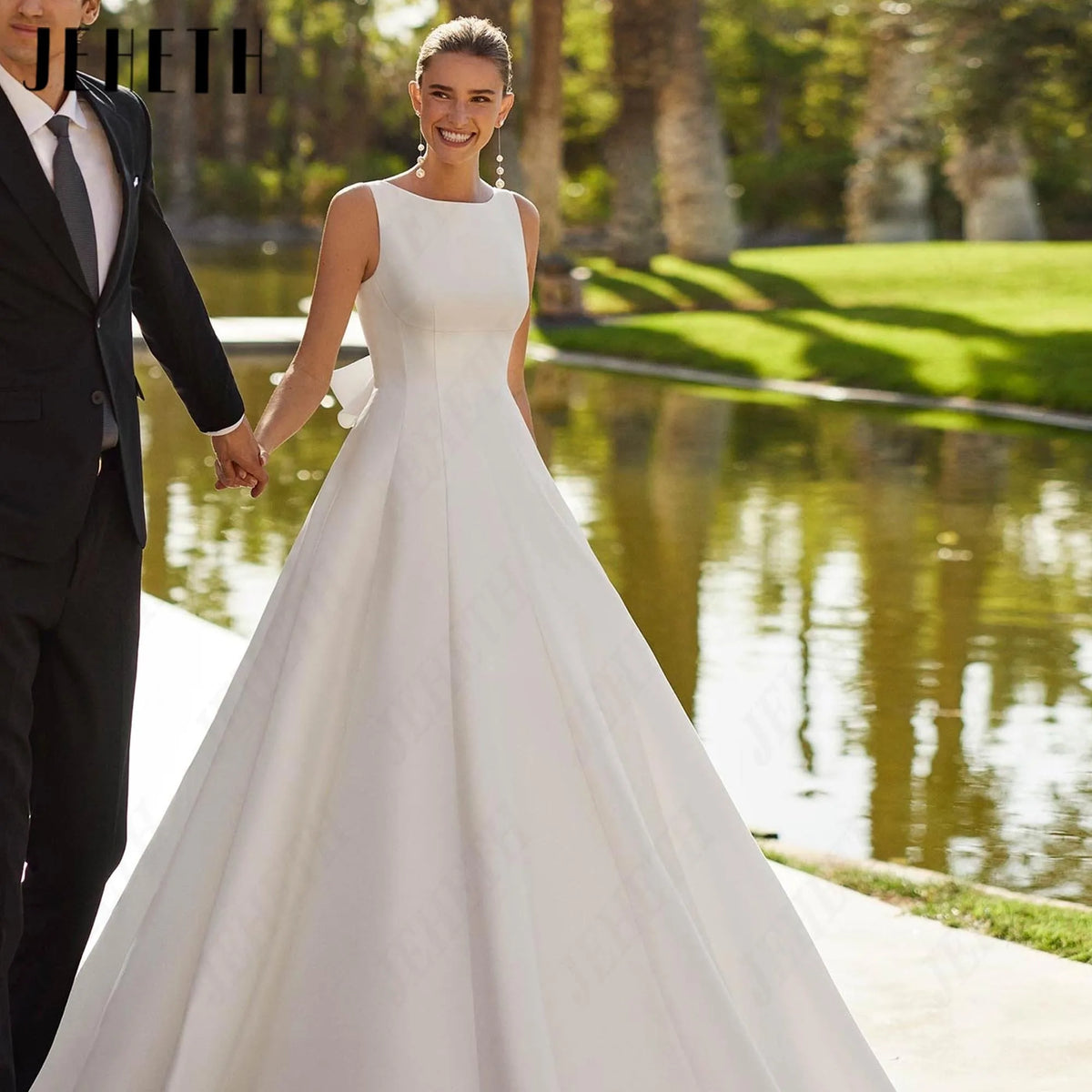 JEHETH Simple A Line Wedding Dresses 2026 New Scoop Neck Backless Bridal Gown For Women Court Train Customized Bride Dress