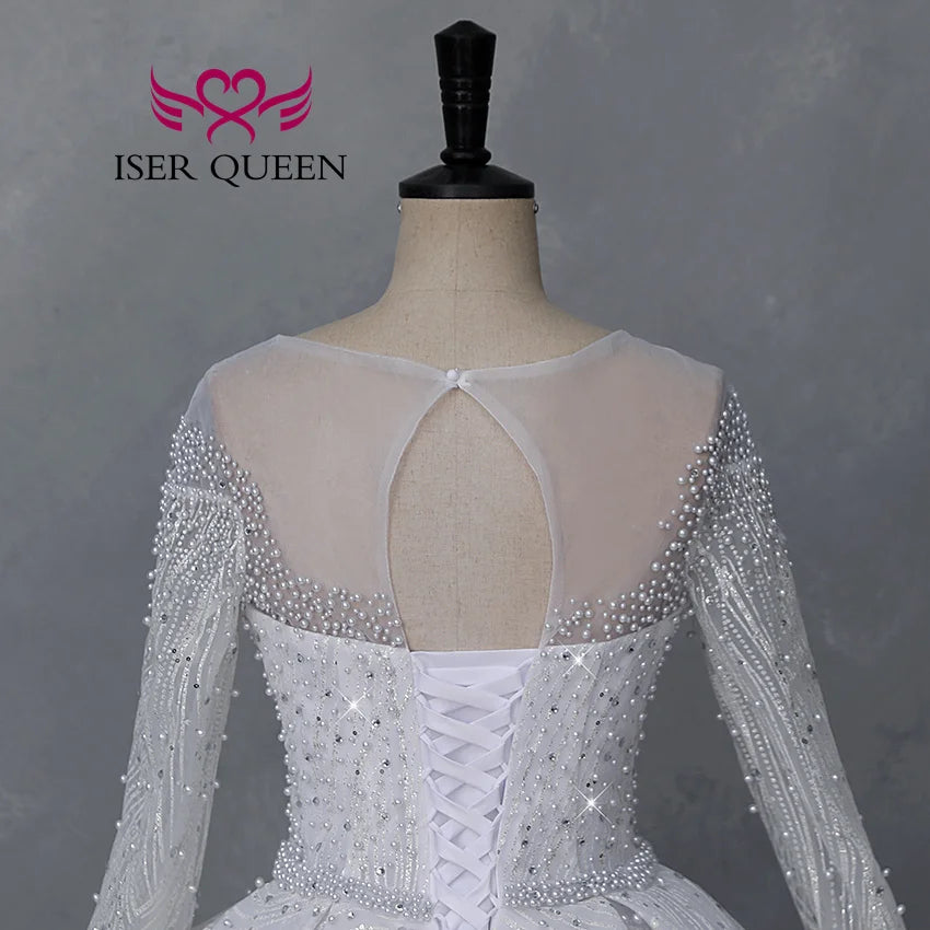 Customized Sheer Neck Long Sleeves Wedding Dress 2026 New Fashion Pearls And Crystal Beaded Luxury Wedding Dress Bride WX0467