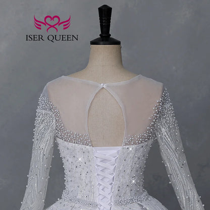 Customized Sheer Neck Long Sleeves Wedding Dress 2026 New Fashion Pearls And Crystal Beaded Luxury Wedding Dress Bride WX0467