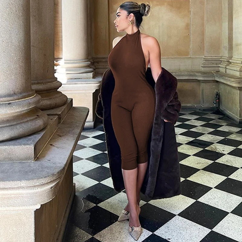 Hugcitar Ribbed Halter Backless Solid Button Sexy Bodycon Skinny Jumpsuit Summer Women Fashion Vacation Romper Streetwear Club