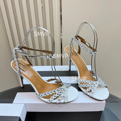 Women Crystal Rhinestone High Heel Sandals 2026 Summer New Toe Ankle Strap Thin Heels Transparent Silver Party Wedding Shoes