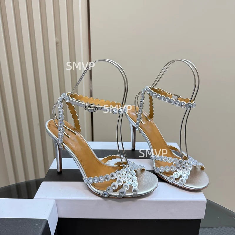 Women Crystal Rhinestone High Heel Sandals 2026 Summer New Toe Ankle Strap Thin Heels Transparent Silver Party Wedding Shoes
