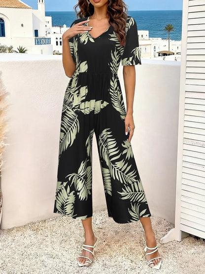 Women's Tropical Leaf Print Short Sleeve Jumpsuit, Summer Casual V Neck Elastic Waist Wide Leg Romper With Side Pockets