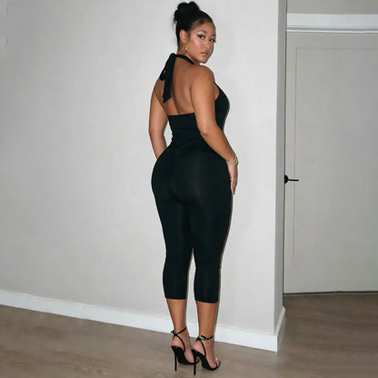 Sexy spicy girl style solid color hollow neck strap seven part jumpsuit