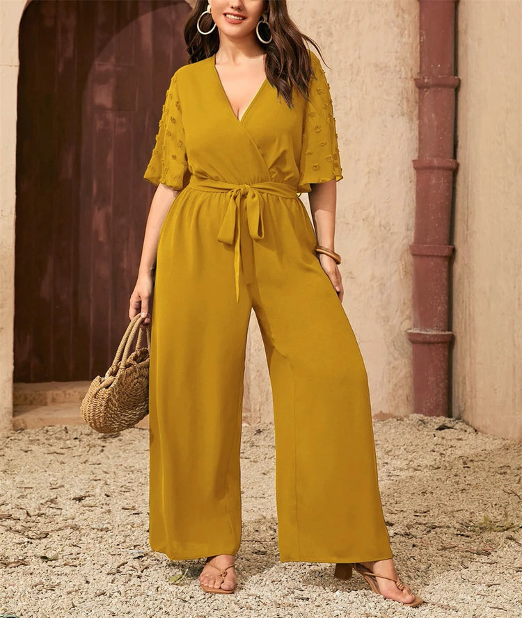 GIBSIE Plus Size Swiss Dot Flounce Sleeve Belted Jumpsuit Women Summer V-neck Elegant Vacation Solid Color Wide Leg Jumpsuits