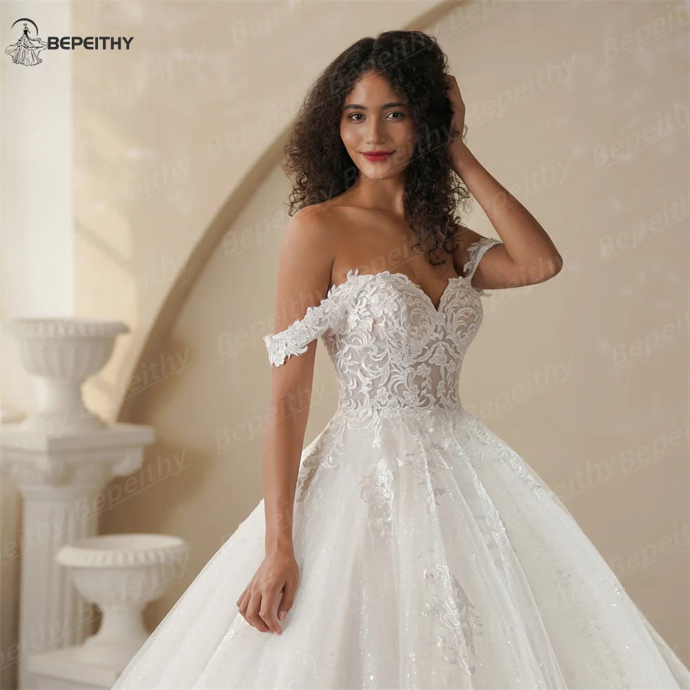 BEPEITHY Customized Princess Off Shoulder Sleeveless Ball Bride Wedding Dresses For Women 2025 Ivory Lace Glitter Bridal Gown