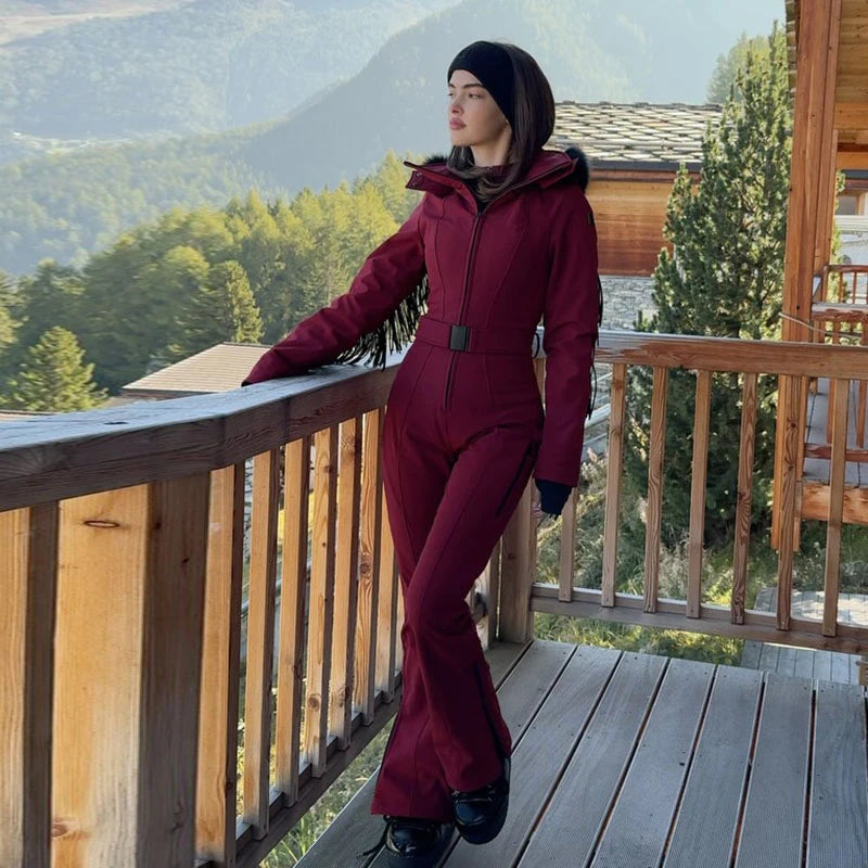 Fashion Pink Faux Fur Patchwork Hood Ski Jumpsuit Women Stand Collar Zipper Slim Pocket One Piece Suit 2026 Winter Lady Skiwears