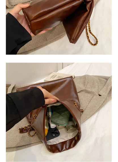 High-quality designer large-capacity underarm tote bag female 2026 new wild light luxury high-end commuter chain messenger bag