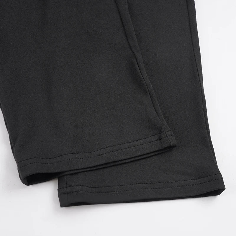 Women's Sleek Black Halter Jumpsuits With Eyelet Detailing Form-Fitting Capri Length Design Chic And Minimalist Summer Outfits
