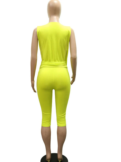 Kricesseen Sexy Solid Sleeveless V Neck Short Jumpsuit Women Summer Bodycon Capri Romper Butterfly Buckle Club Outfit Streetwear