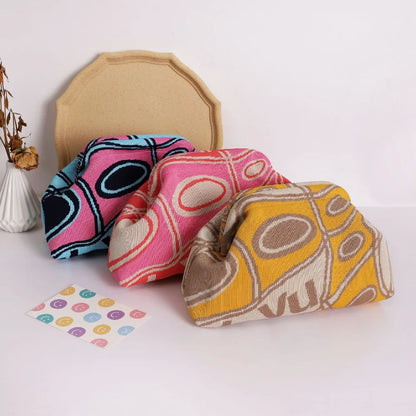 Trendy knitted clip bag versatile large capacity suitable for storage bags New high-end pattern clutch bag