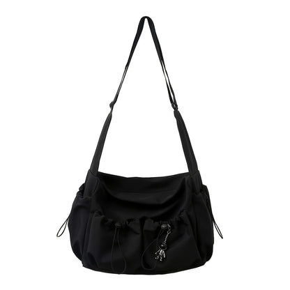 Fashionable Crossbody Bag with Drawstring Accent - Spacious & Secure Zipper Closure - Includes Stylish Bag Charm