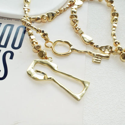Exggerated Gold-plated Plastic Beads Chain With  Alloy Key Lock Necklace For Women Jewelry Fashion Show Model Waist Accessory