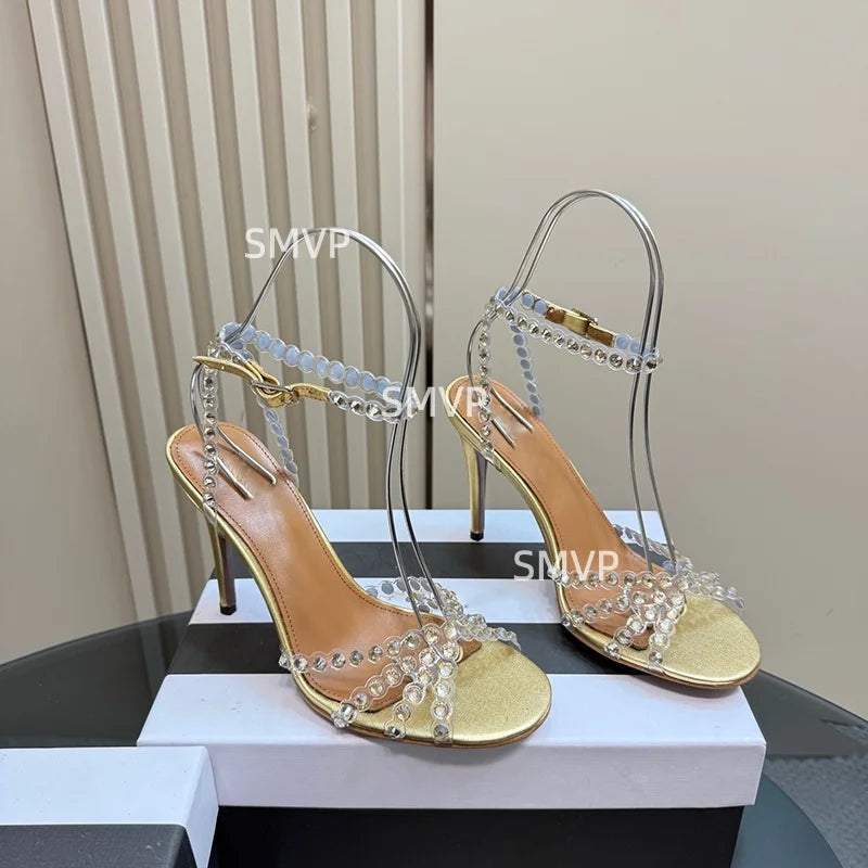 Women Crystal Rhinestone High Heel Sandals 2026 Summer New Toe Ankle Strap Thin Heels Transparent Silver Party Wedding Shoes