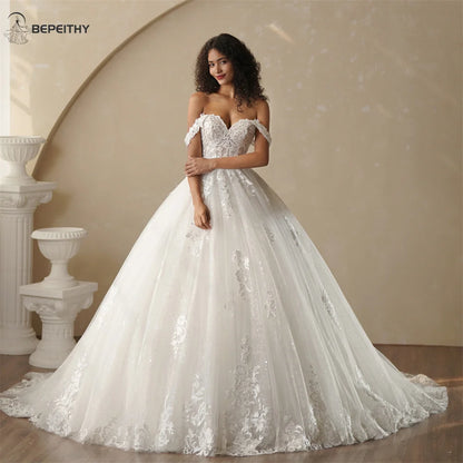 BEPEITHY Customized Princess Off Shoulder Sleeveless Ball Bride Wedding Dresses For Women 2025 Ivory Lace Glitter Bridal Gown