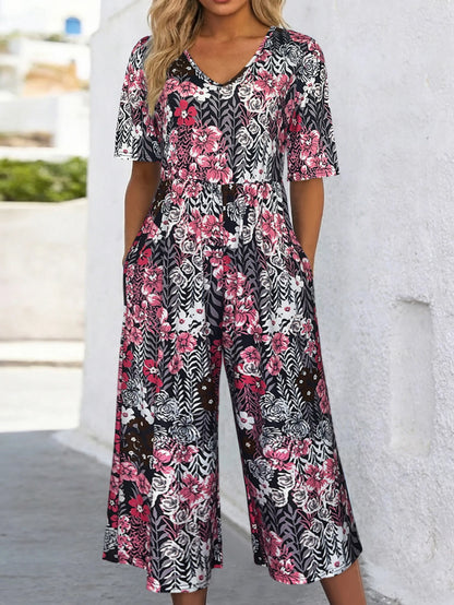 Women's Pink Floral Print Short Sleeve Jumpsuit, Summer Casual V Neck Elastic Waist Wide Leg Romper With Side Pockets