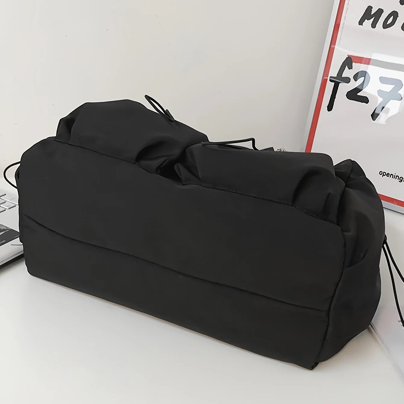 Fashionable Crossbody Bag with Drawstring Accent - Spacious & Secure Zipper Closure - Includes Stylish Bag Charm